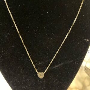 Gold tone lock necklace